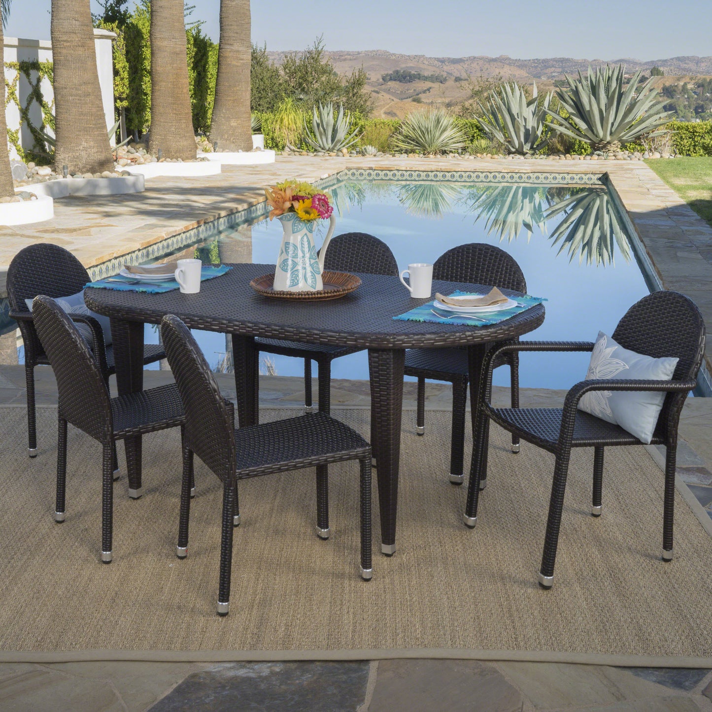 Ashlynn Outdoor 7 Piece Multi-brown Wicker Dining Set with Stacking Chairs