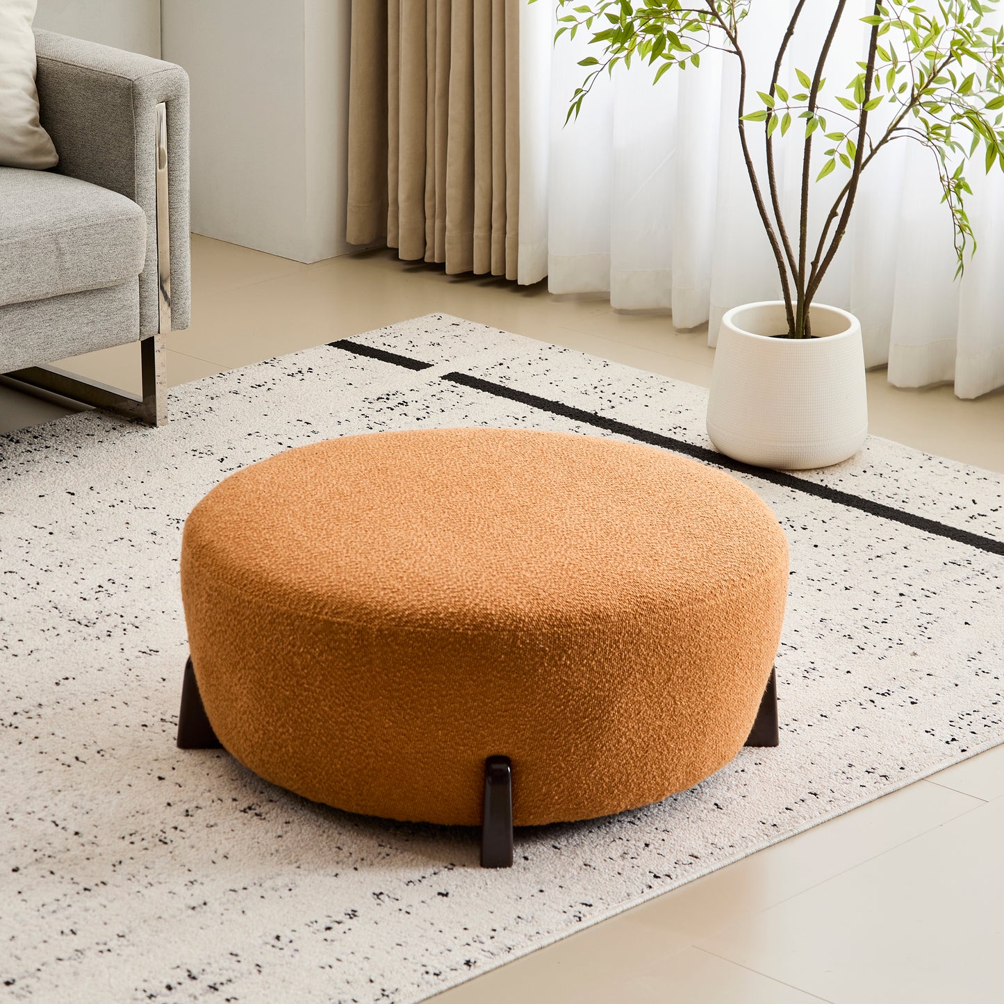 Modis Round Ottoman: Boucle Top with Splayed Rubber Wood Legs