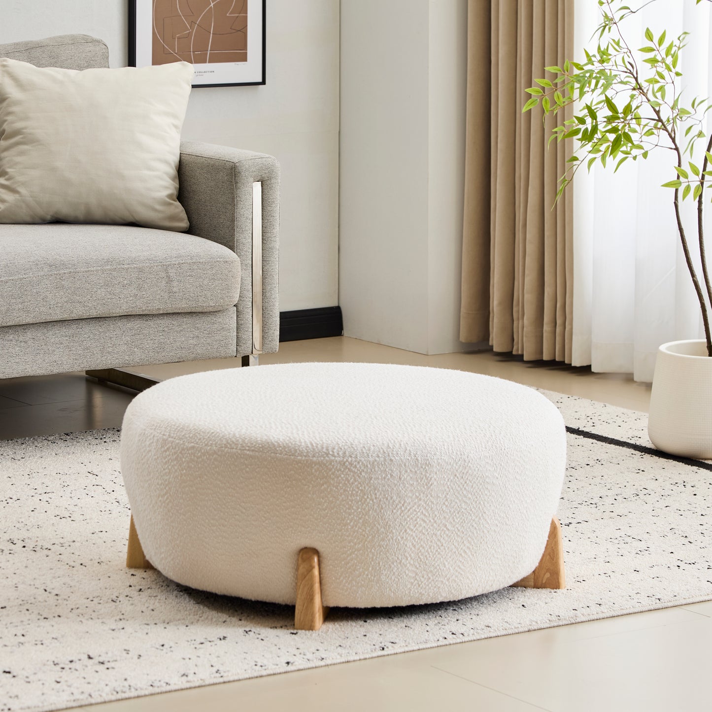 Modis Round Ottoman: Boucle Top with Splayed Rubber Wood Legs