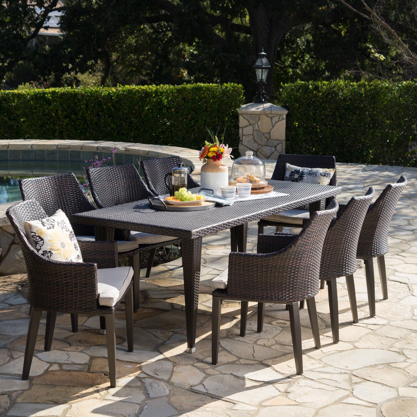 Lenorde Outdoor 9 Piece Wicker Rectangular Dining Set with Water Resistant Cushions