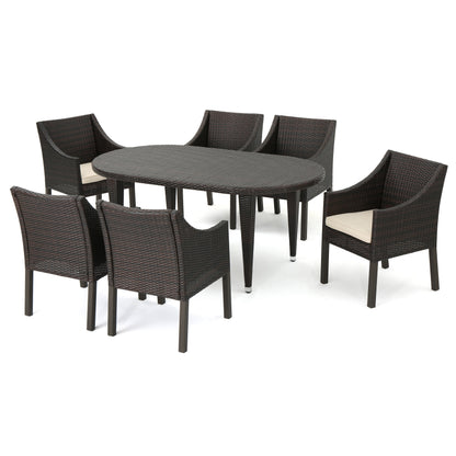 Nicholas Outdoor 7 Piece Wicker Oval Dining Set with Water Resistant Cushions