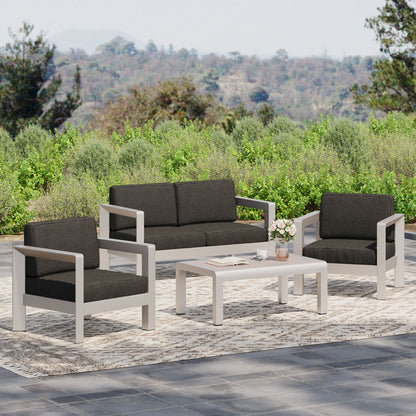 Kenia Outdoor 4-Seater Aluminum Chat Set with Tempered Glass-Topped Coffee Table, Silver and Gray