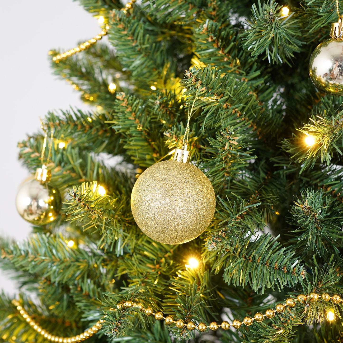 Stellan 6FT Christmas Tree with 250 Warm White LED Lights – 1000 PVC & Hard Needle Tips, Hinged Branch Design, Sturdy Metal Stand – Full Realistic Holiday Tree