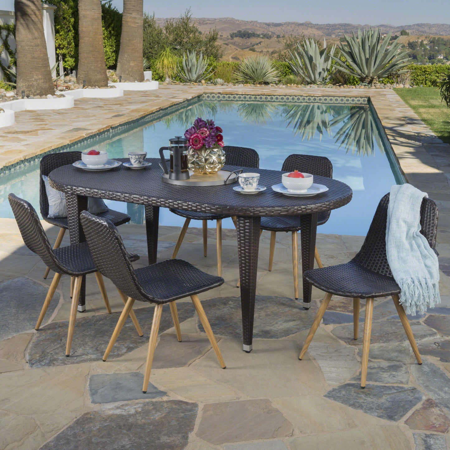 Lynda Outdoor 7 Piece Wicker Oval Dining Set with Wood Finished Legs