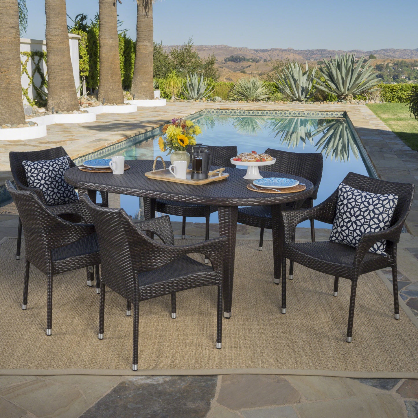 Tannis Outdoor 7 Piece Multi-brown Wicker Oval Dining Set with Stacking Chairs
