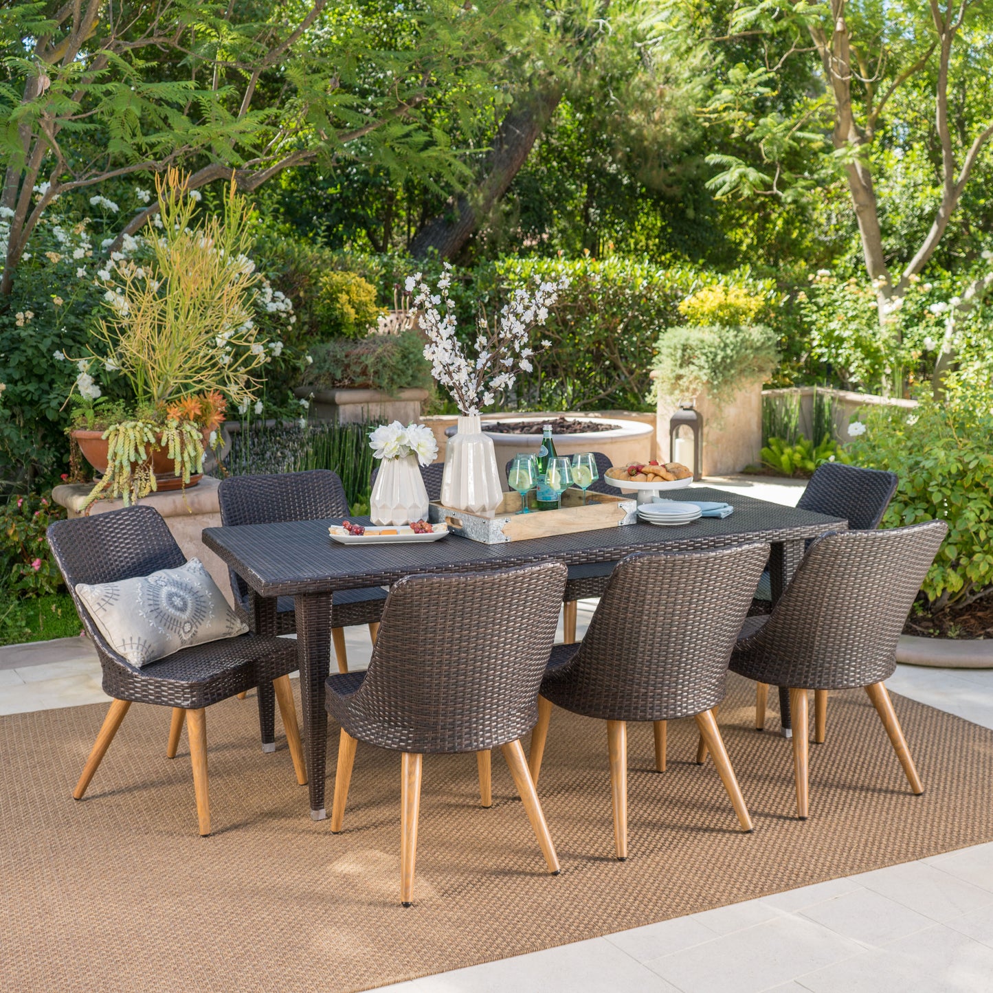 Jamey Outdoor 9 Piece Multi-brown Wicker Dining Set with Wood Finished Metal Leg