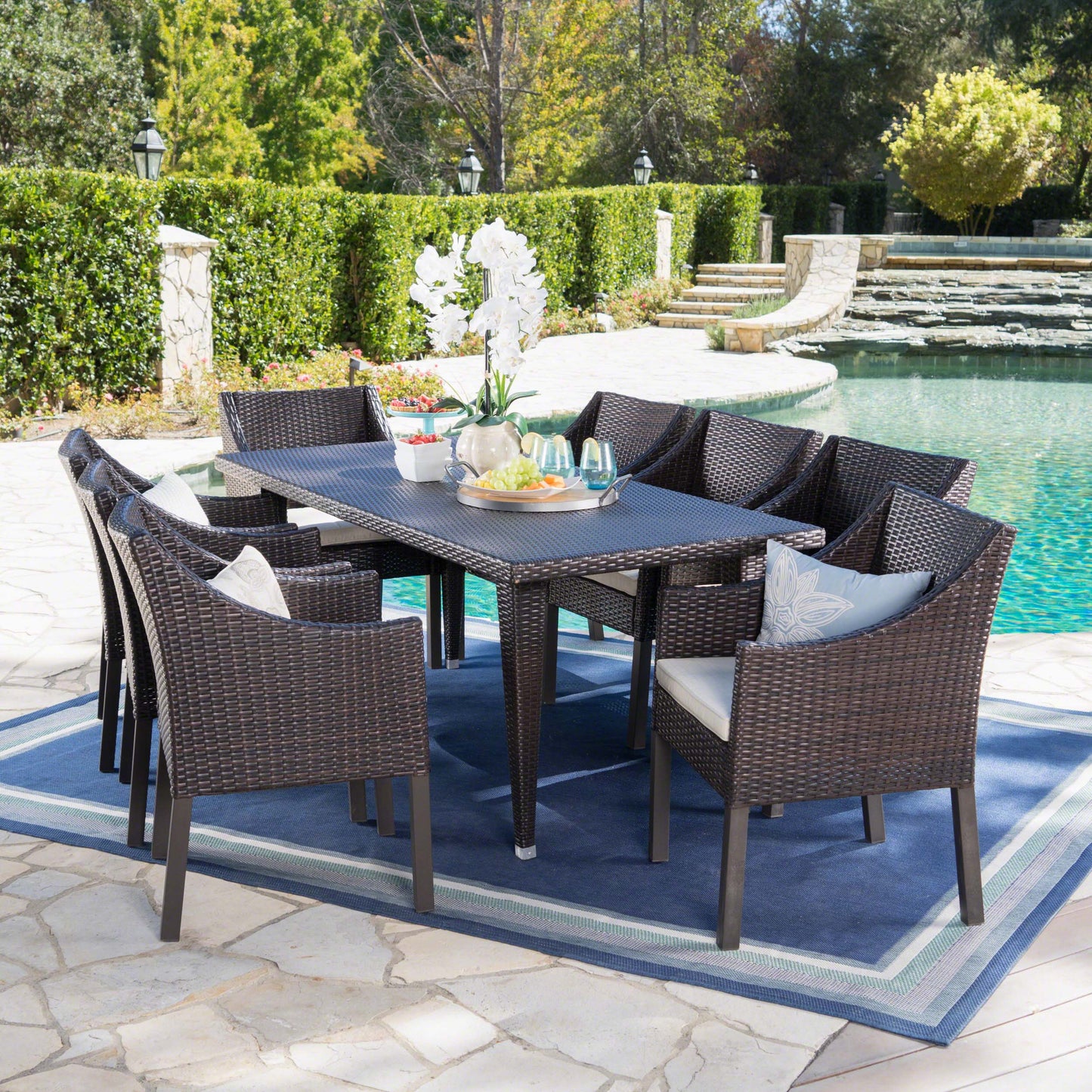 Alanna Outdoor 9 Piece Wicker Dining Set with Water Resistant Cushions