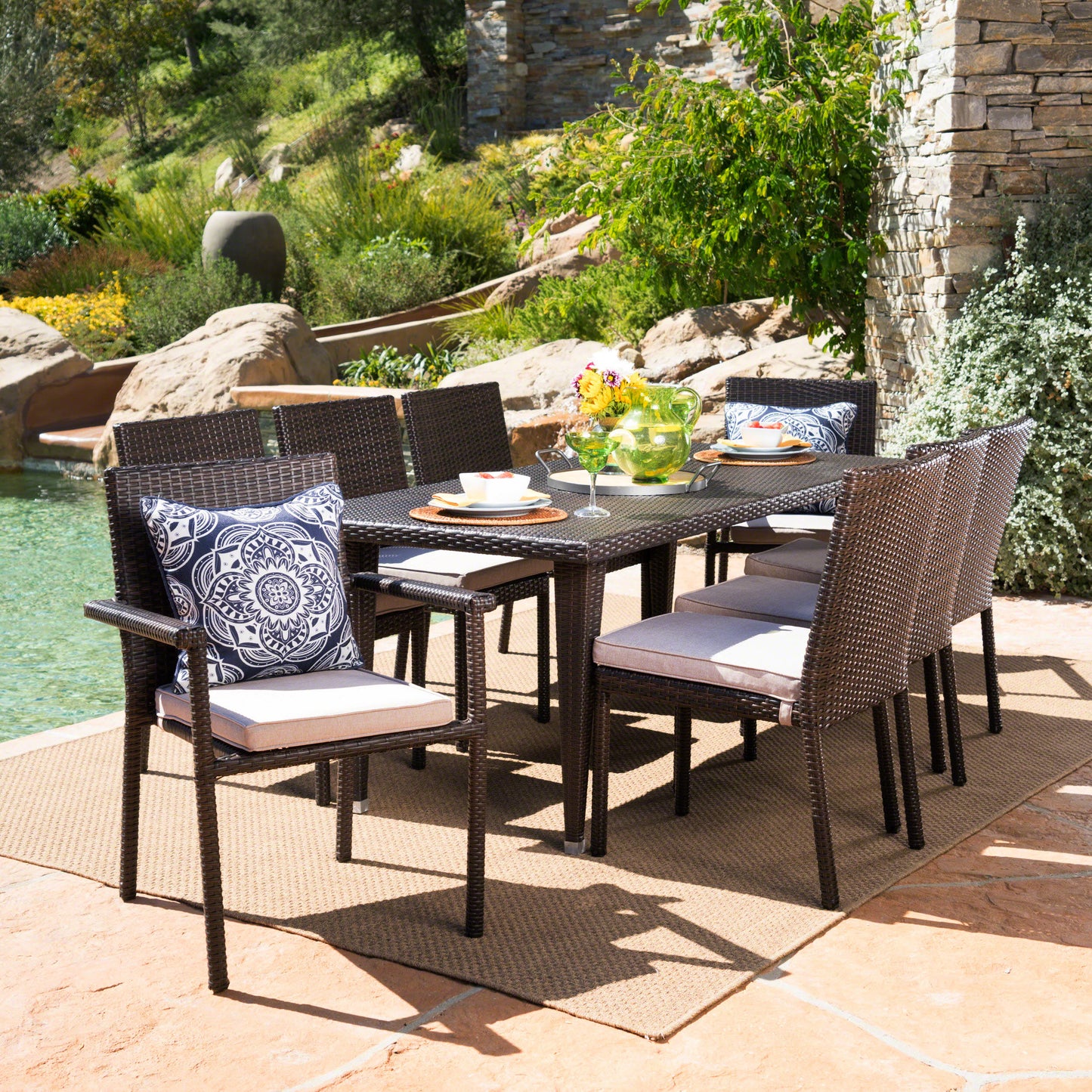 Grand Outdoor 9 Piece Wicker Dining Set with Water Resistant Cushions