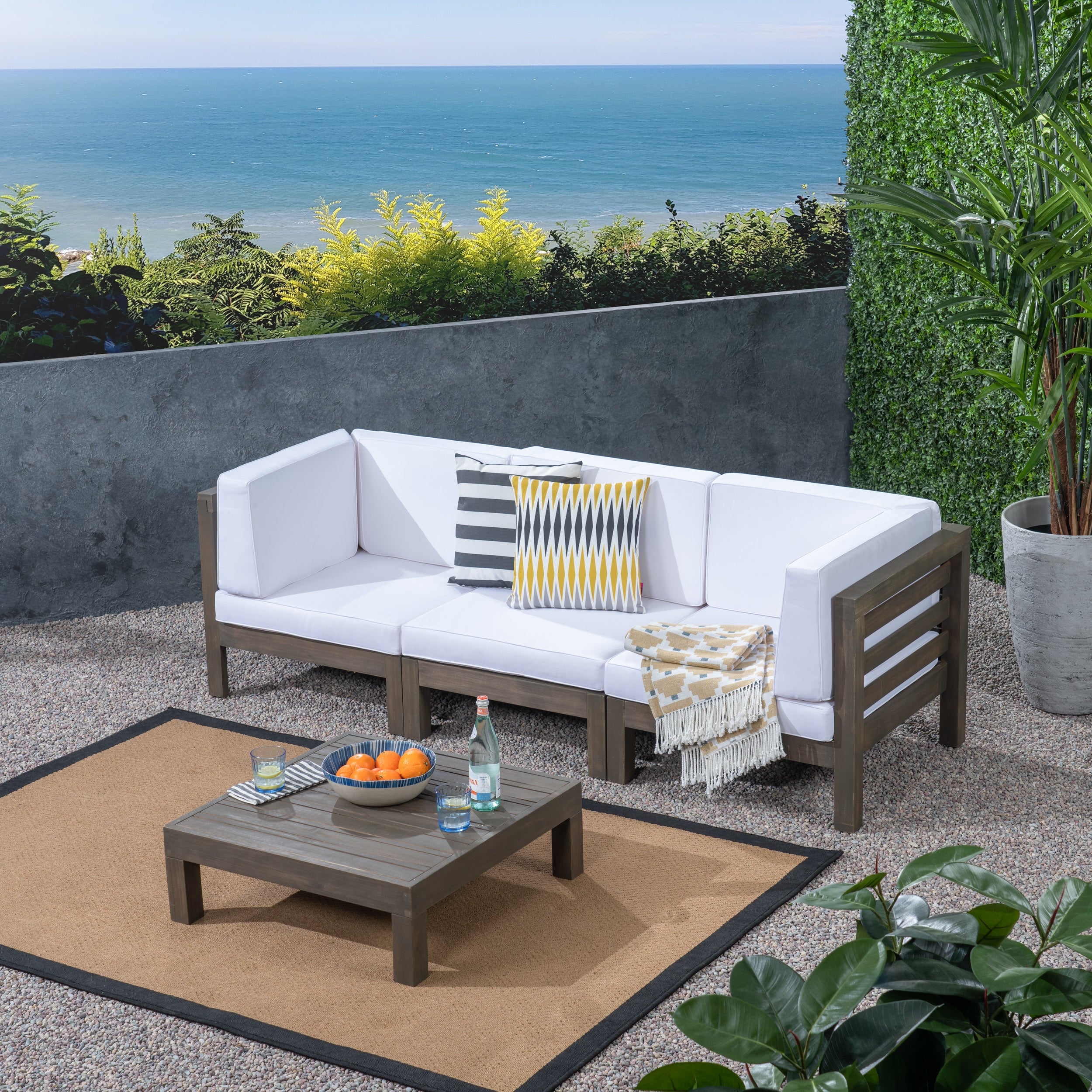 Seaham teak patio sectional hotsell with cushions