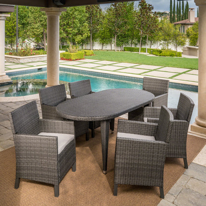Crete Outdoor 7 Piece Wicker Oval Dining Set with Water Resistant Cushions