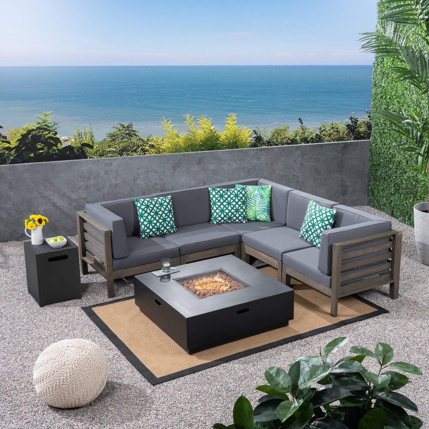 Krystin Outdoor 7 Piece V-Shaped Acacia Wood Sectional Sofa Set with Fire Pit and Outdoor Cushions